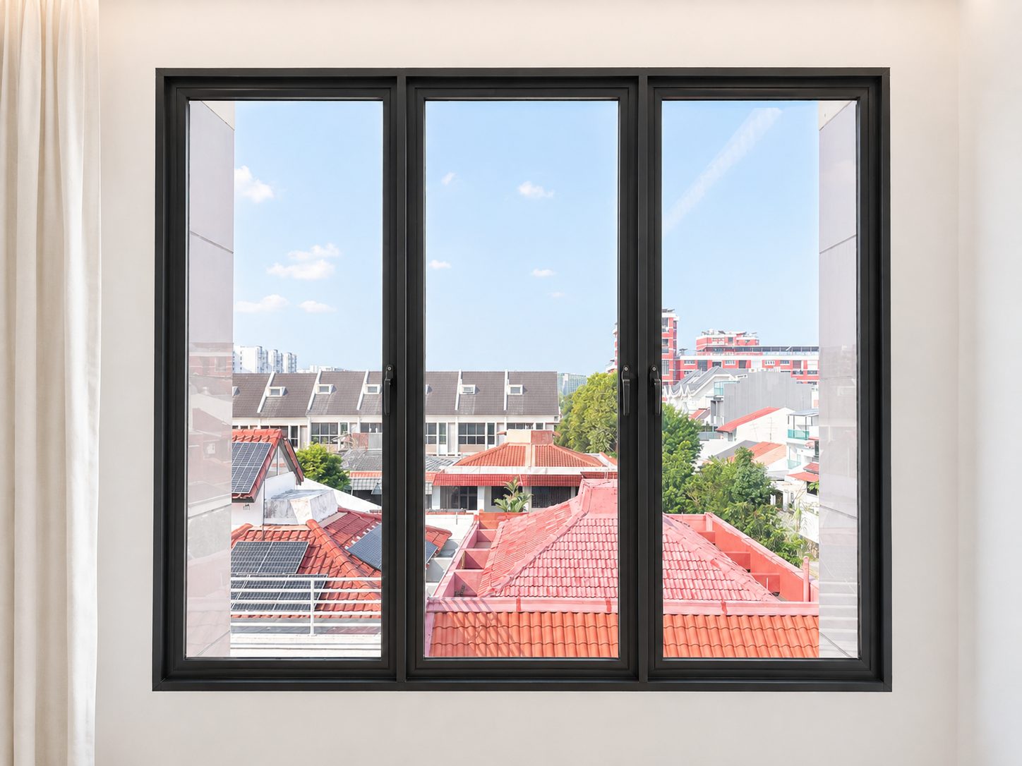The living room window and the outlook over the rooftops