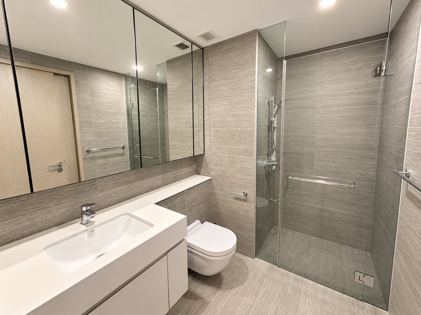 Bathroom with vanity, mirrored cabinet and frameless glass shower screen